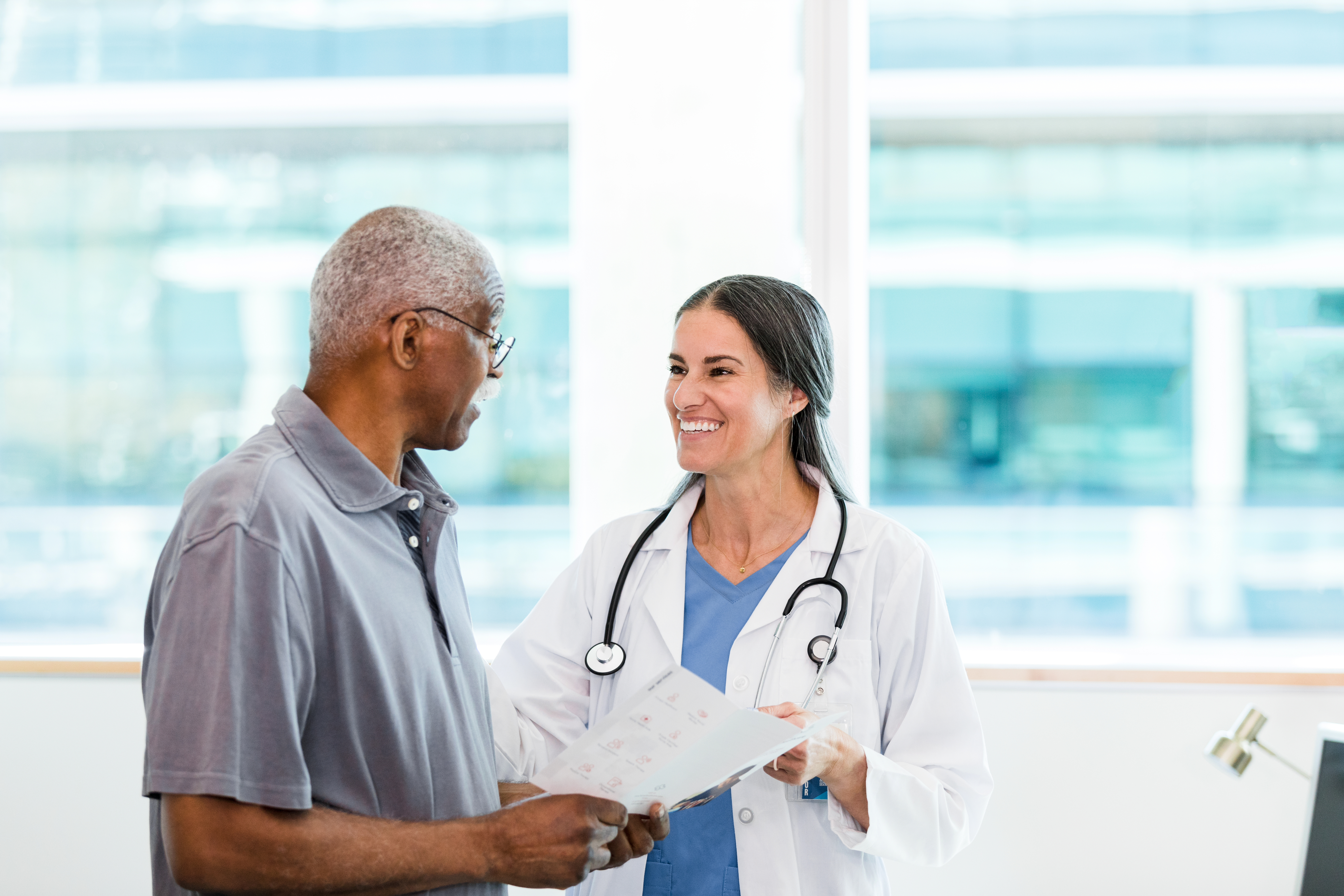 Physician talking to a patient.