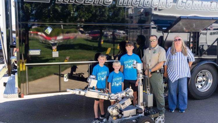 Dairy Farm Family with Mobile Police Unit