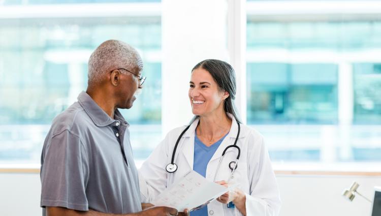 Physician talking to a patient.