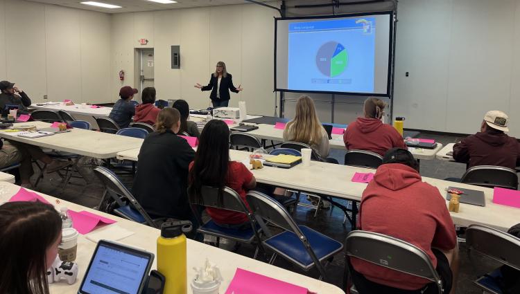 Instructor teaching a class of students.